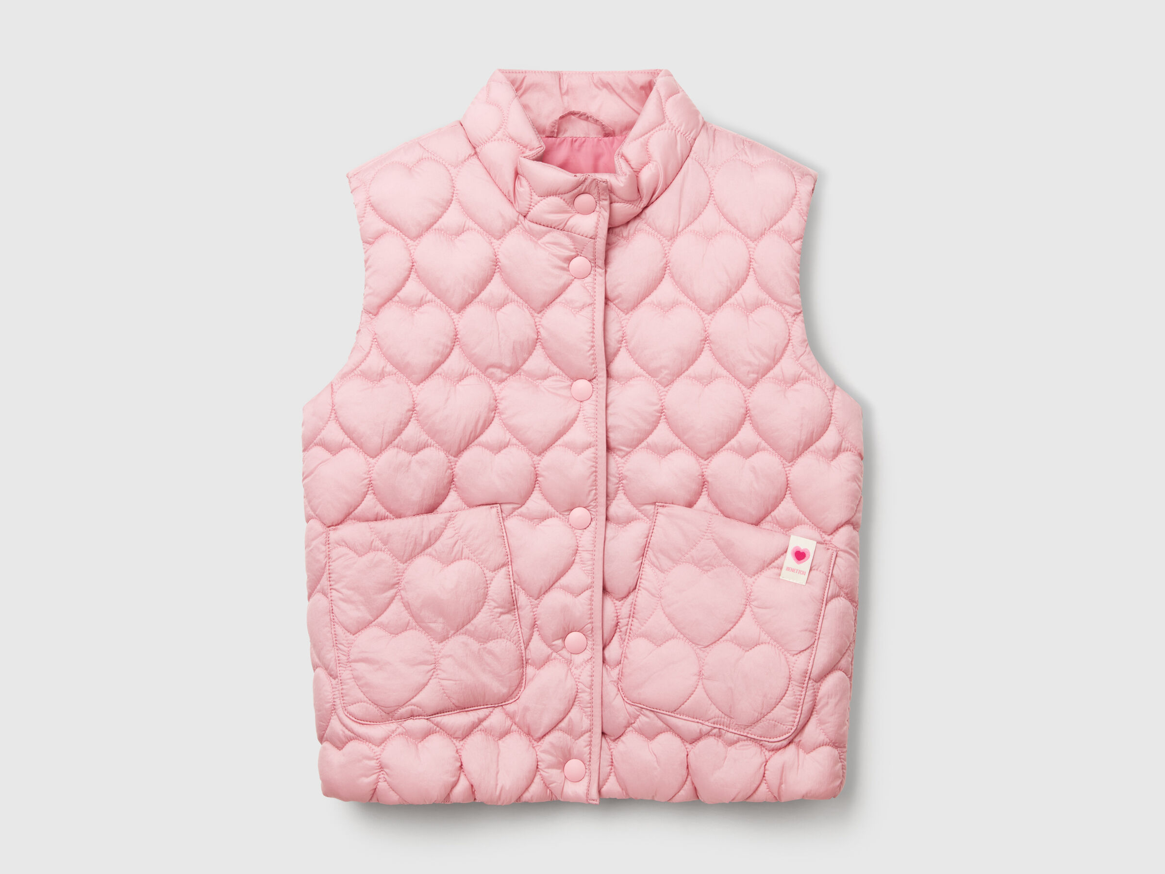 Gilet matelassé avec piqué en forme de cœur